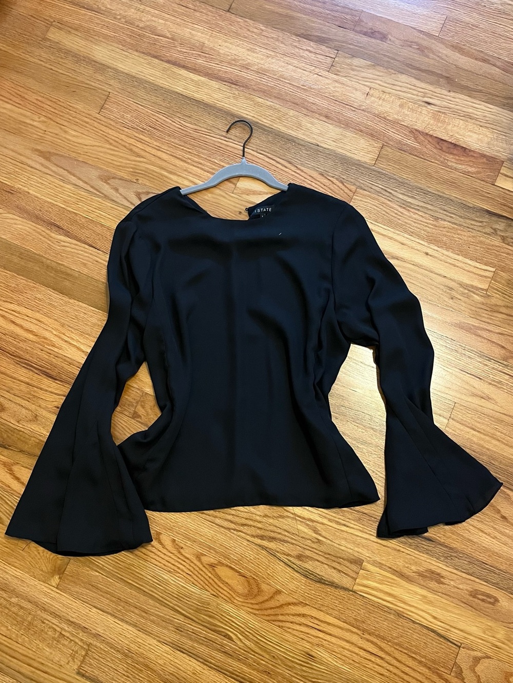 1. State Black Bell Sleeve Blouse